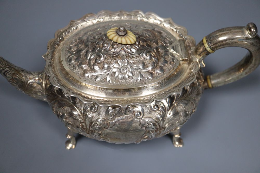 A matched late Victorian 3-piece silver tea set, London, 1897(2) and Birmingham, 1893, gross 20.5oz.